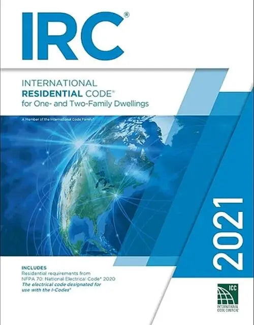 ICC 2021 International Residential Code IRC Code Book, residential building code guide, black hardcover, open pages, detailed code standards