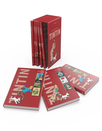 Complete set of Tintin comics in red bundle, featuring colorful illustrated covers from the Adventures of Tintin series.